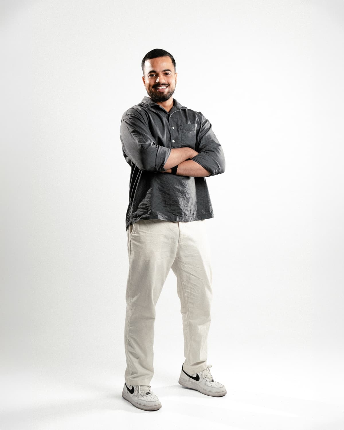 Mohammed, full-stack developer, standing with arms crossed